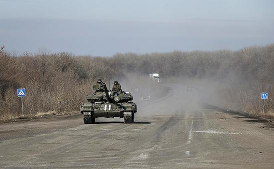 В Минске достигнута договоренность об отводе танков и артиллерийских вооружений калибром до 100 мм